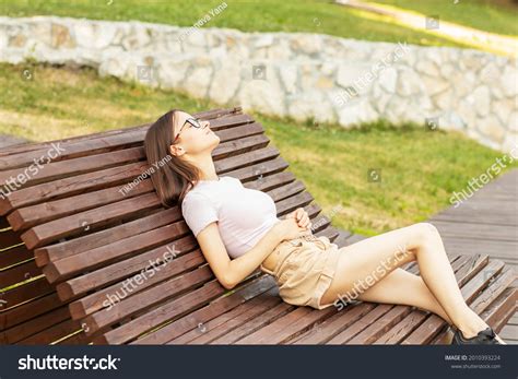 sunbathing girls|29,027 Young Women Sunbathing Stock Photos & High